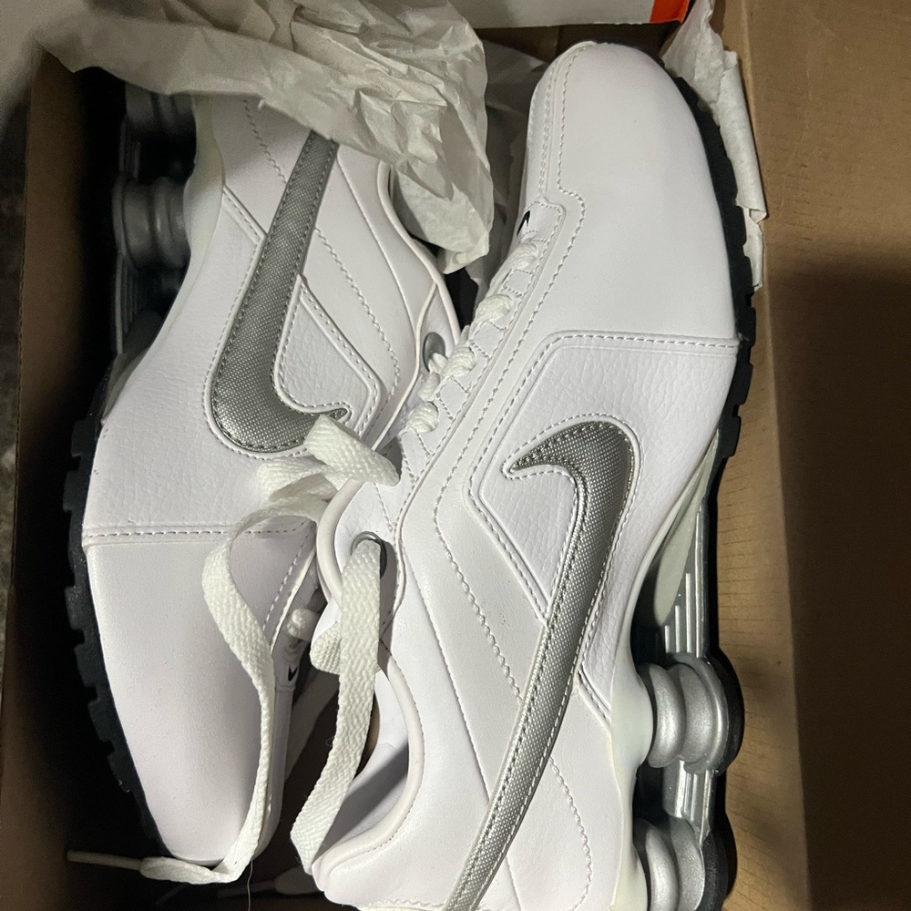 Brand new Women’s Nike white and gray sneakers. Size 6